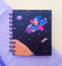 Libreta "Niña y cohete"