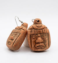 Arete cabeza olmeca