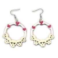 Arracadas calaveras corazones