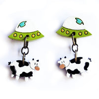 Aretes Vaca abducida