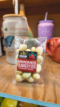 Confitado de arándanos con chocolate blanco