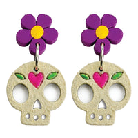 Aretes calavera flor movil