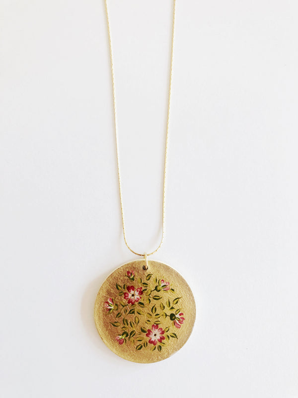 Collar circular flores rojas