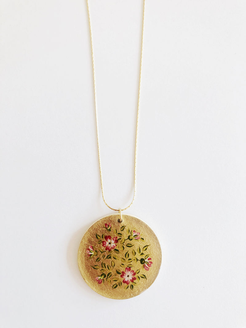 Collar circular flores rojas
