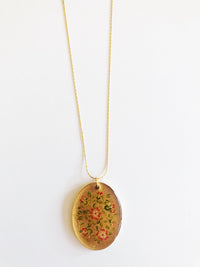 Collar ovalado flores rojas b