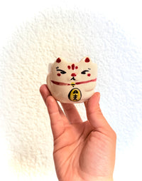 Tacita maneki