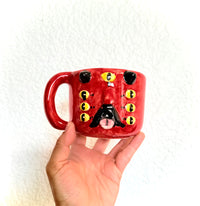 Taza Diablo rojo 7 ojos