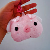 Llavero puerco volador
