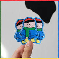 Sticker "Niño abrigado"