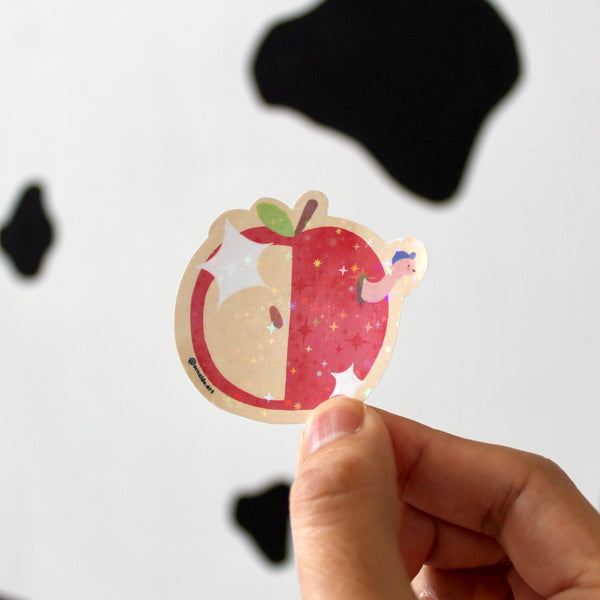 Sticker manzana con gusanito