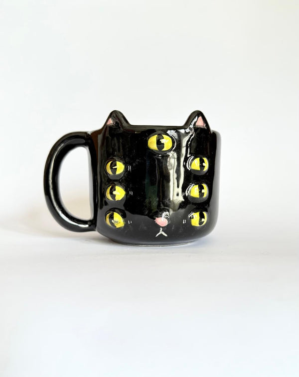 Taza Gato 7 ojos