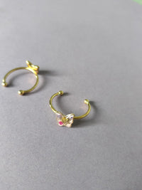 Anillo ajustable con flores mariposa dorado