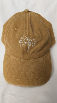 Gorra monsteras bordadas